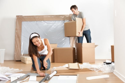 Professional flat removals in Kingstonuponthames with moving van and packed boxes