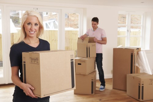 Team collecting bulky household furniture from a Kingston flat