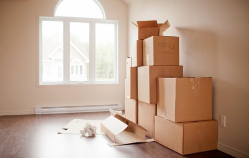 Removal team handling furniture during a Kingston upon Thames move
