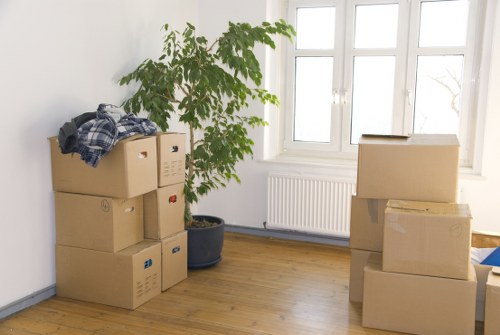 Professional movers loading furniture during an urgent move