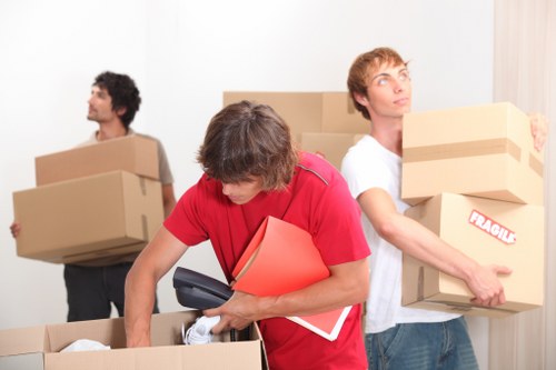 Professional movers handling household items in Kingston upon Thames