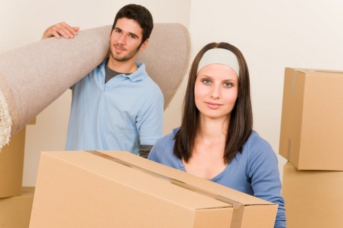 Careful packing for a home move in Kingston upon Thames inside a family house