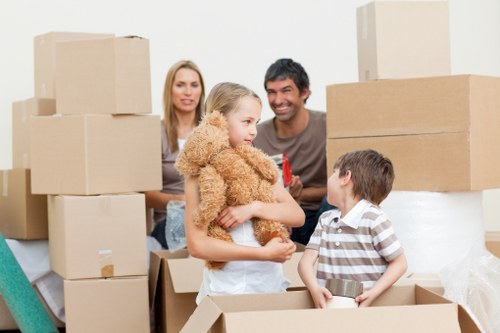 Local packing and unpacking team preparing boxes for transport in Kingston upon Thames